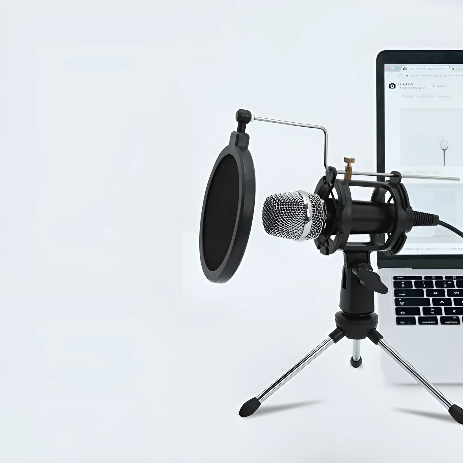 Black condenser microphone on adjustable aluminium stand with USB and 3.5mm cables for computer and mobile streaming