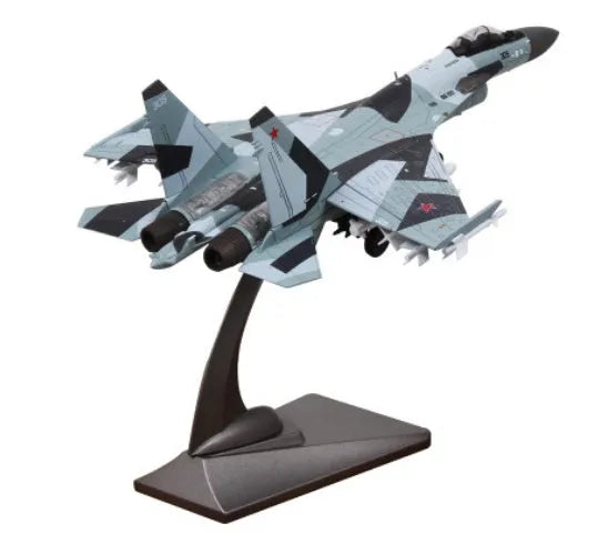 Su35 die-cast model in 1/72 scale with Russian camouflage paint finish on a white background