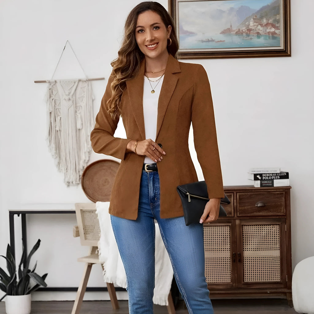 A brown men's single-breasted lapel suit coat with long sleeves on a hanger.