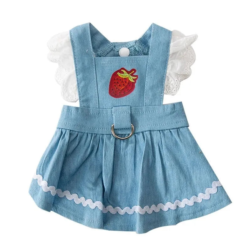 Bondi Blue dog skirt with strawberry and denim print on a small dog model.