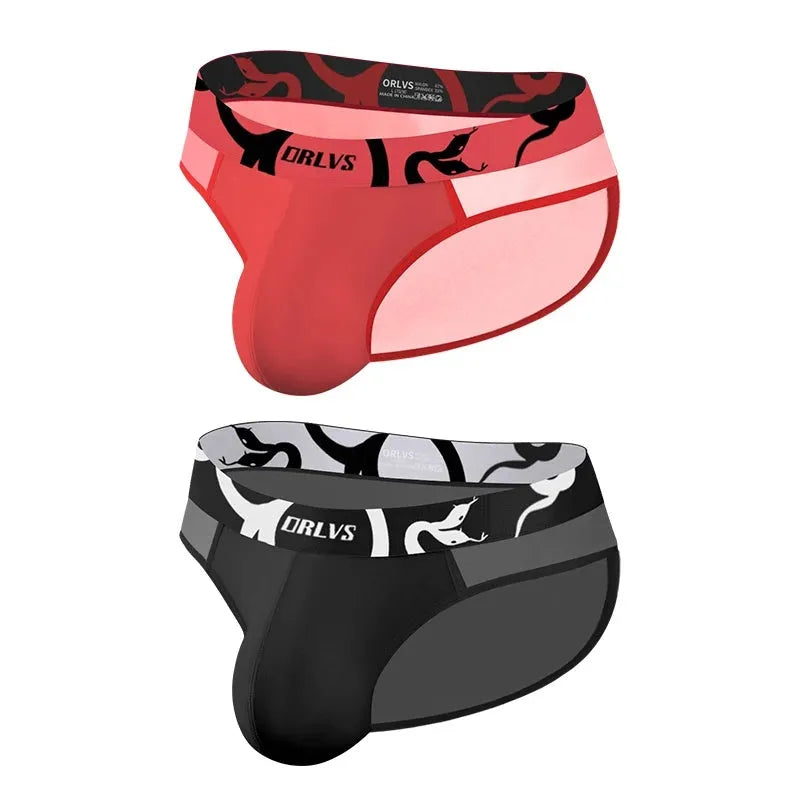 Men's solid colour modal mesh low-waist boxer shorts in black, pink, and red for sports