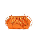 Shell-shaped crossbody bag with hair clip attachment in multiple colour options showing organised internal compartments