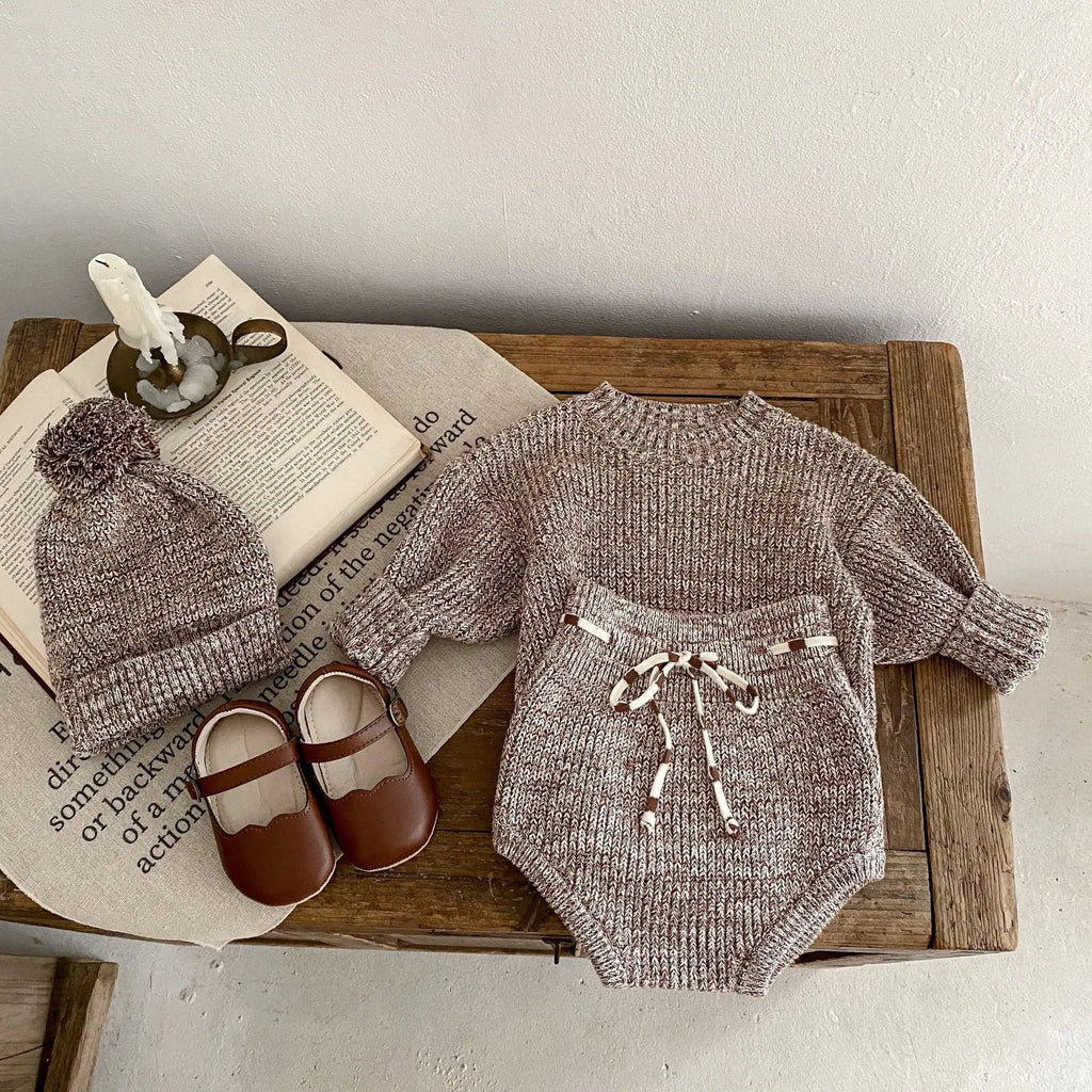 Infant girl dark brown knitted three-piece set with fur ball hat on hanger