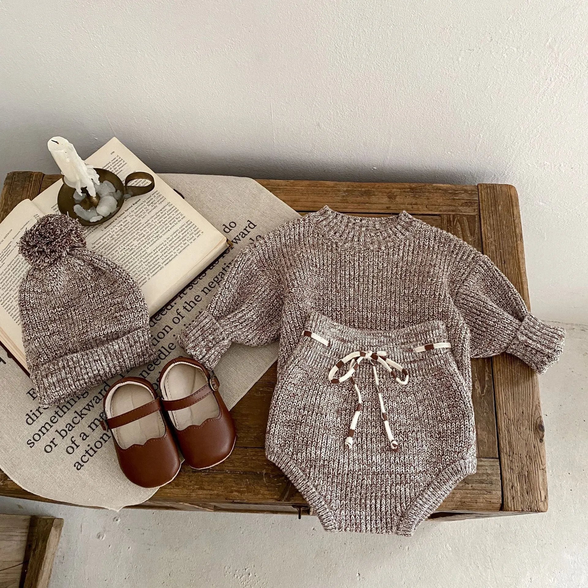 Infant girl dark brown knitted three-piece set with fur ball hat on hanger