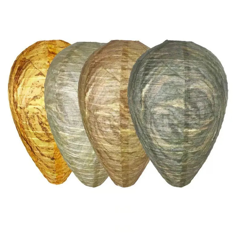 Oval flannel honeycomb lantern for wasp deterrence in a garden setting