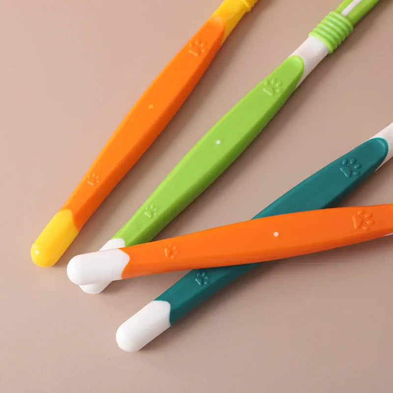 Pet toothbrush oral cleaning product in various colours including orange, green, yellow, blue pink, and black yellow