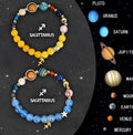 Set of two natural stone beaded bracelets with zodiac charms on an adjustable cord.