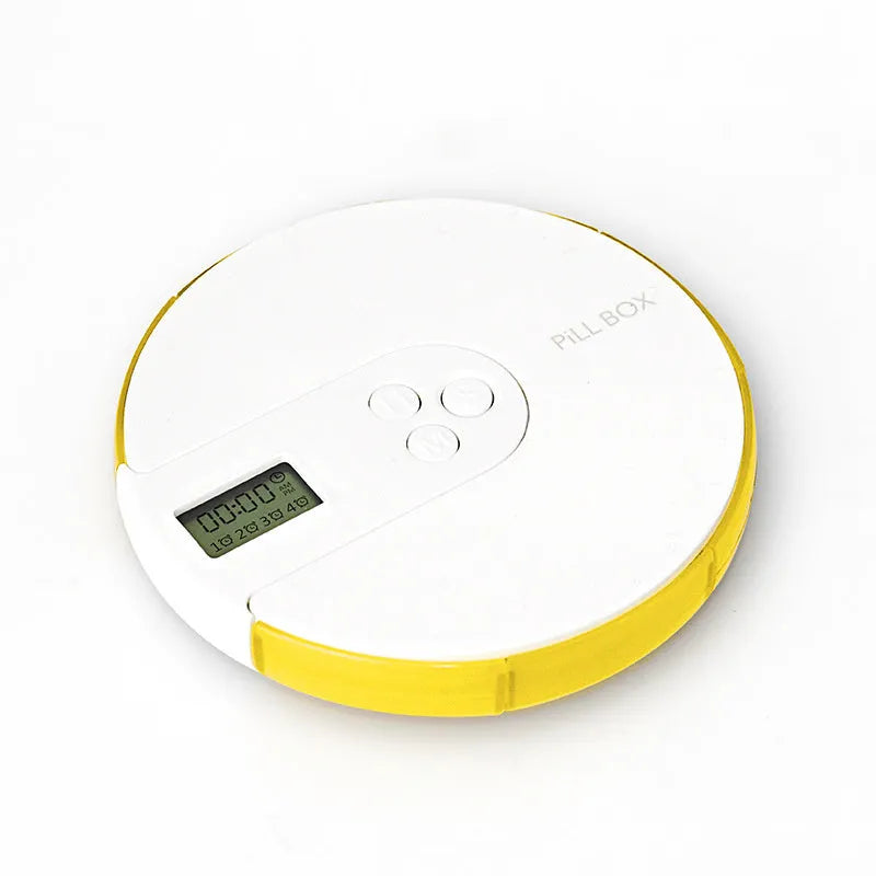 Blue 7-compartment electronic pill dispenser with alarm clock display on a white background.