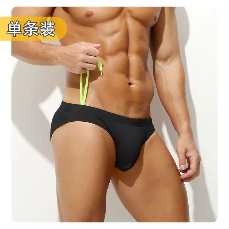 Men's low waist solid colour nylon briefs in Army Green, front view