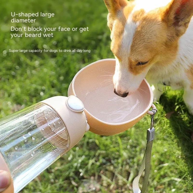Yellow portable dog water bottle and feeder bowl for outdoor travel