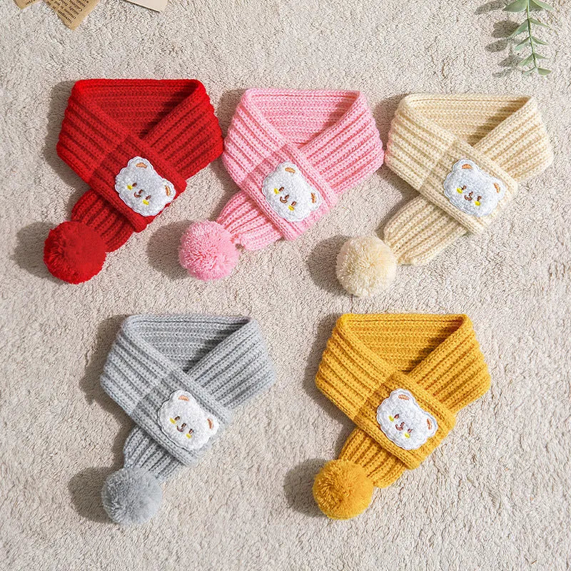 Fashion knitted wool pet cat winter scarf with cartoon embroidery in beige on white background