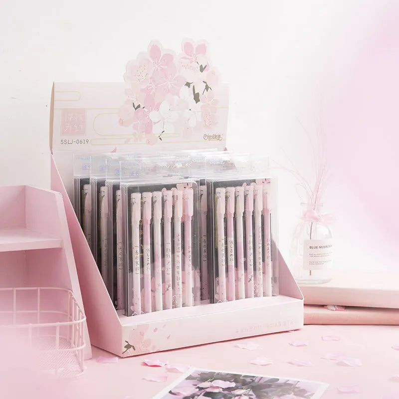 Six black Creative Sakura gel pens with 0.5mm needle tube refills arranged together