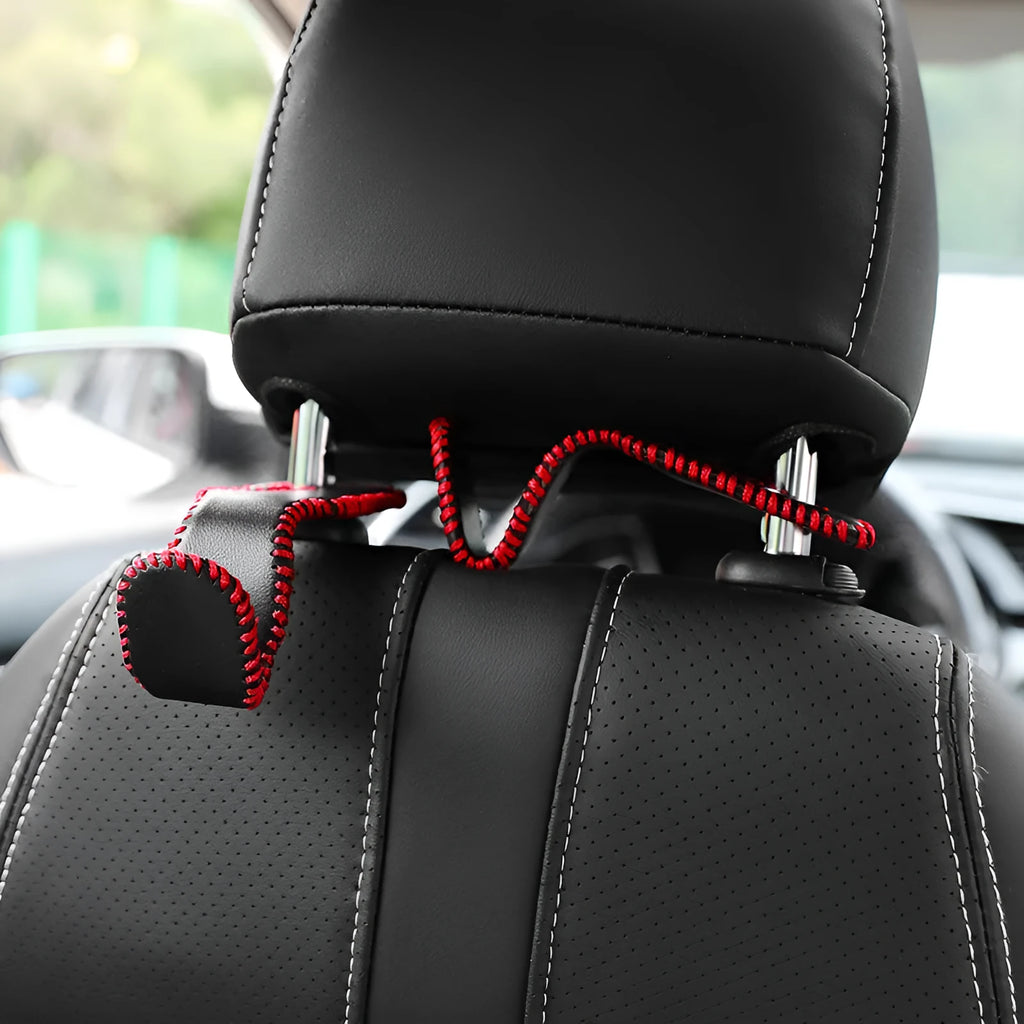 Stainless steel car seat back hook with gold finish and leather strap for vehicle interior organisation