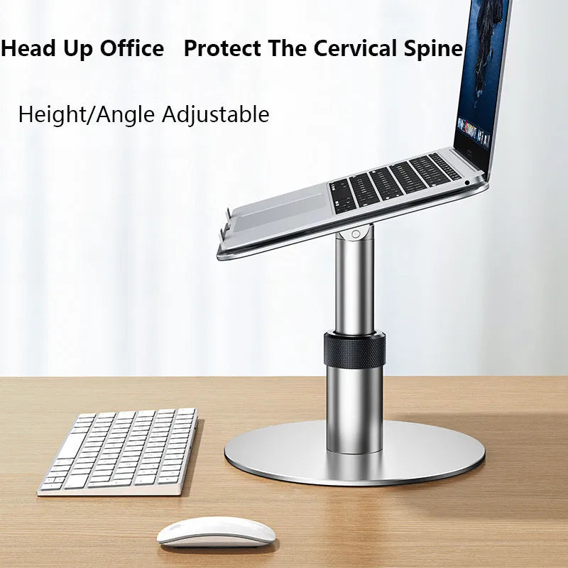 Silver aluminium laptop stand at adjustable height with rotating base and non-slip pads