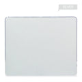 Black aluminium alloy double-sided mouse pad on a desk with a computer mouse on top