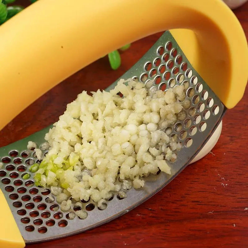304 stainless steel garlic press with ergonomic handle in choice of colours