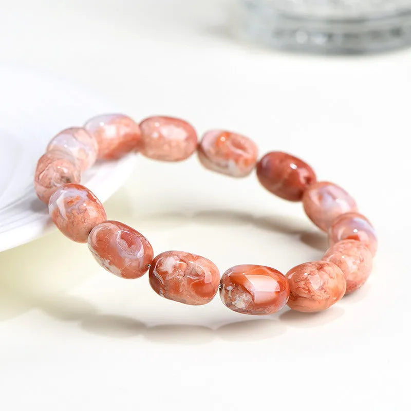 Natural cherry agate barrel shaped bead bracelet with 10x14mm geometry beads and Ruyi design elements