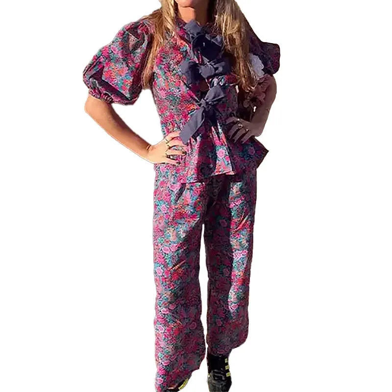 Women's floral printed trousers suit set with tie-neck puff sleeve top and matching trousers