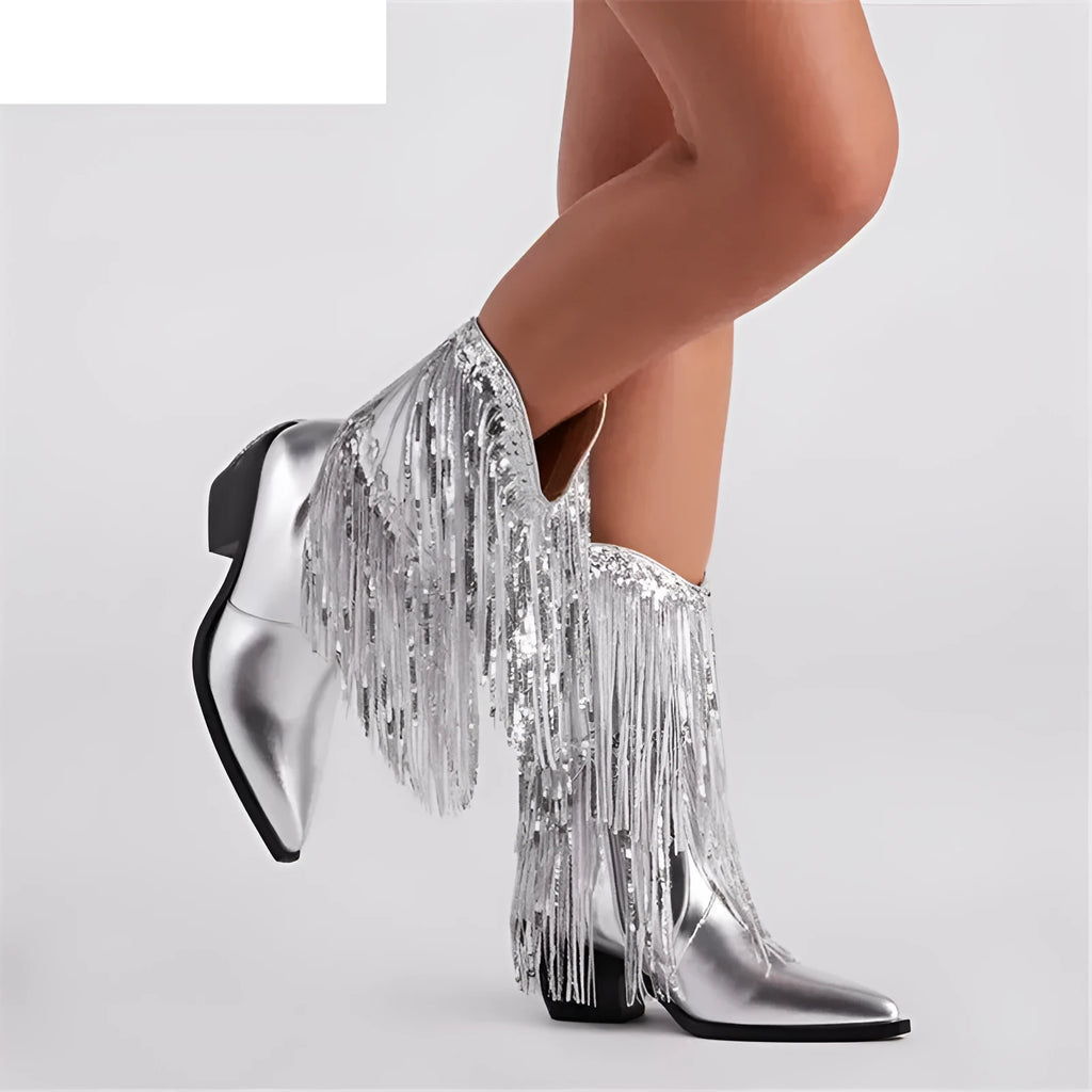 Women's black chunky heel tassel boots with a pointed toe and high stiletto heel on a white background.