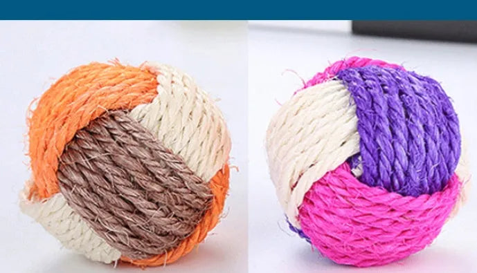 Natural sisal cat toy ball 6cm diameter for biting play on white background