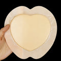 Large skin-coloured silicone foam pressure ulcer dressing sticker on white background