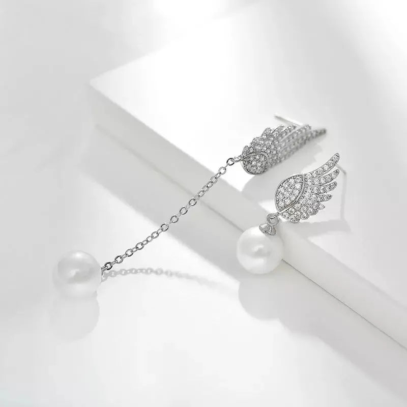 Silver angel wing earrings with diamond treatment and gold-plated gemstone accents