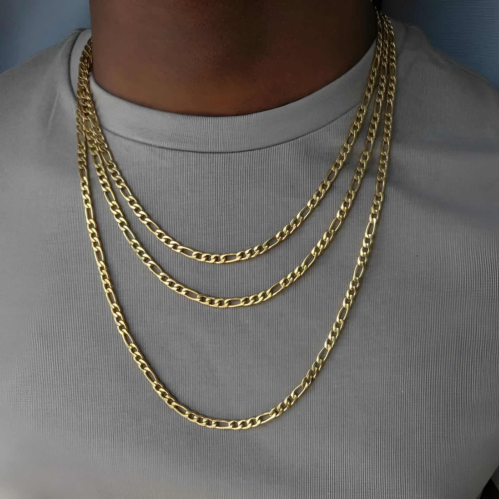 Men's alloy geometric necklace in gold finish, 50cm length, on a flat surface