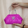 Women's soft polyester dinner messenger bag in lavender purple showing fold, diamond, and chain details.