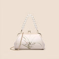 Beige women's embroidered shoulder bag in soft PU leather with shell-shaped design