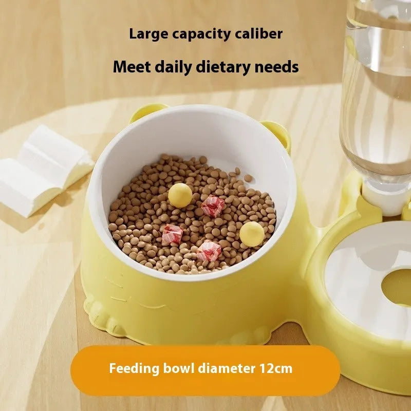 Grass green double bowl automatic pet feeder for cats and dogs on an elevated plastic stand.