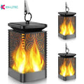 Set of four black solar-powered hanging torch lights with flickering flame LED effect in a garden setting