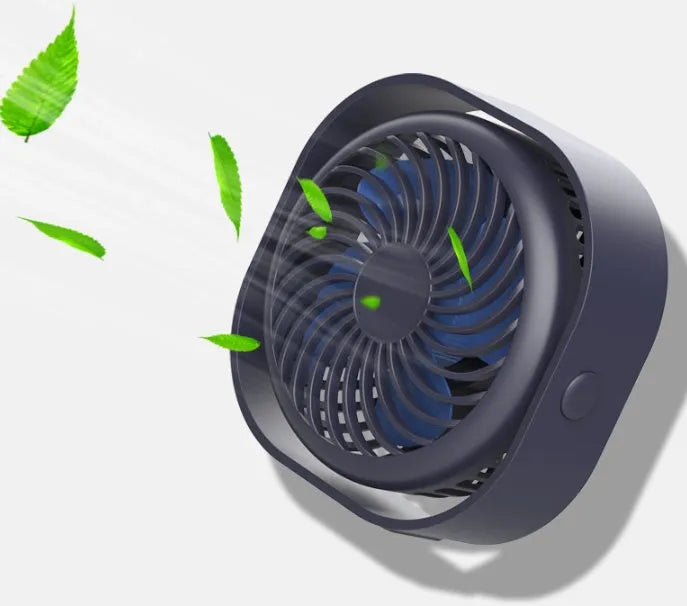 A small, modern USB desk fan in blue with a rotating head on a white desk.