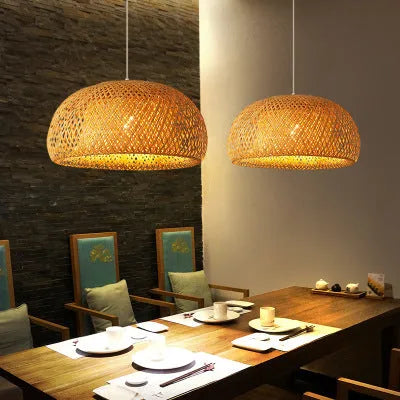 Brown bamboo woven pendant light with E27 base measuring 180x300mm