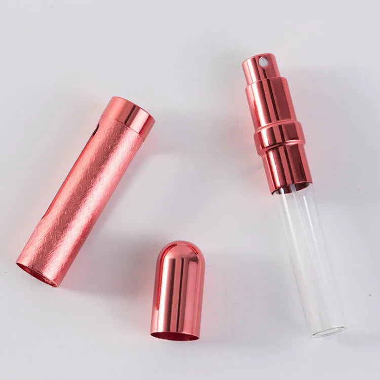 Slim 12ml aluminium travel perfume bottle with glass liner in blue, gold, pink, red, silver, and violet colours.