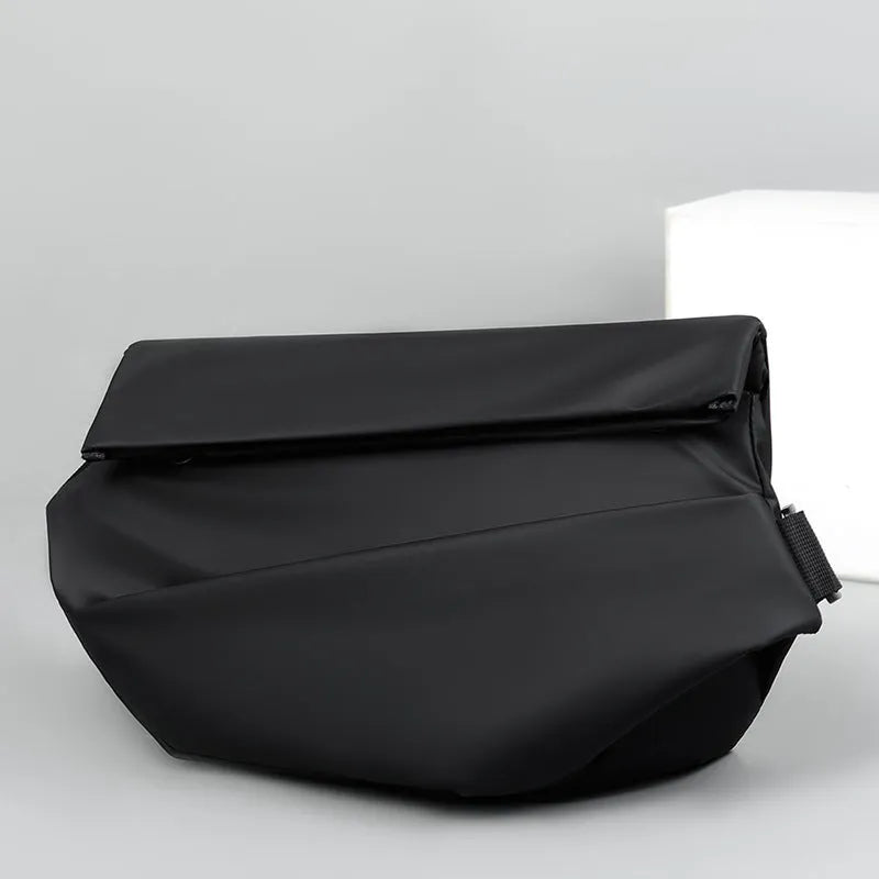 Grey men's medium square crossbody bag made of PU with a single shoulder strap and soft handle.
