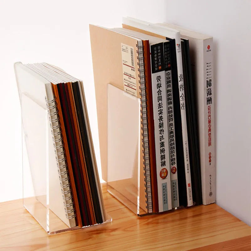 Transparent acrylic bookshelf displaying two books on a desk