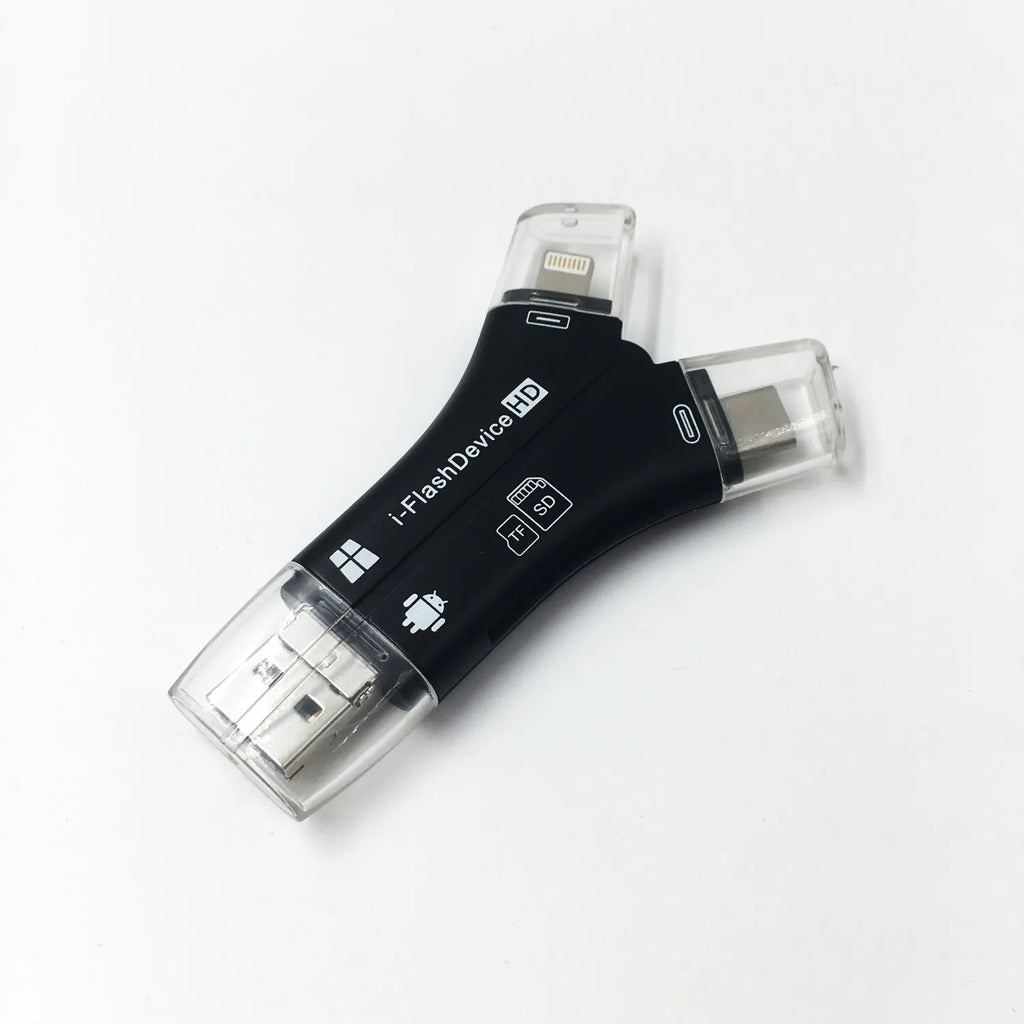 White NK908 4-in-1 SD card reader with Lightning, USB-C, Micro USB and USB ports on a wooden table.