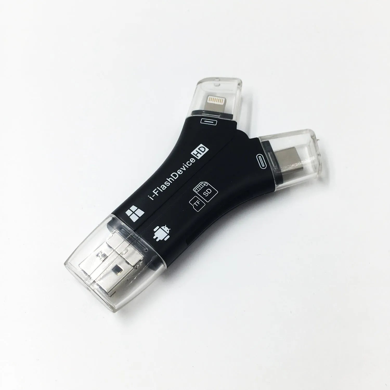 White NK908 4-in-1 SD card reader with Lightning, USB-C, Micro USB and USB ports on a wooden table.