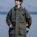 Men's multi-pocket workwear jacket in black or green, loose fit, long sleeve, sizes M to 3XL