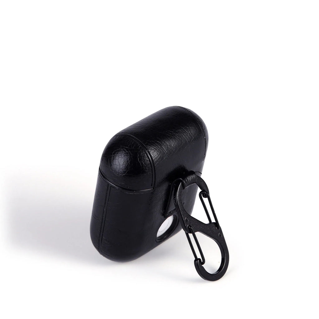 Genuine leather protective case for Apple Airpods charging box in black, brown, light brown, and red.