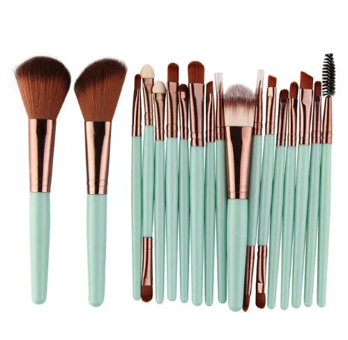 MAANGE 18-piece makeup brush and tool set with fan brushes laid out.
