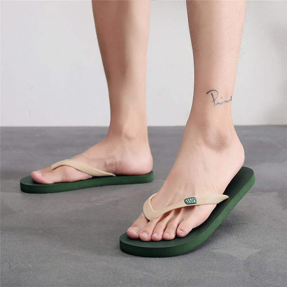 Men's black flip-flops with a textured rubber sole and lightweight EVA upper.