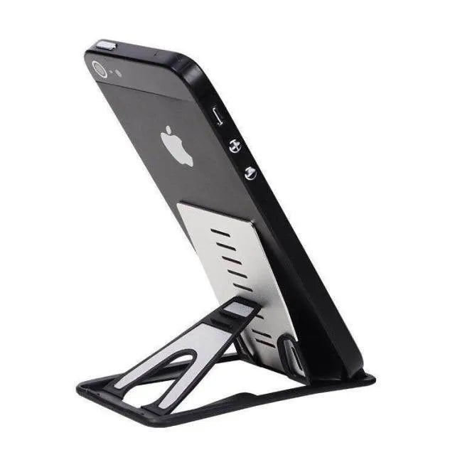 Black card phone holder measuring 8.5cm by 5cm on desktop surface