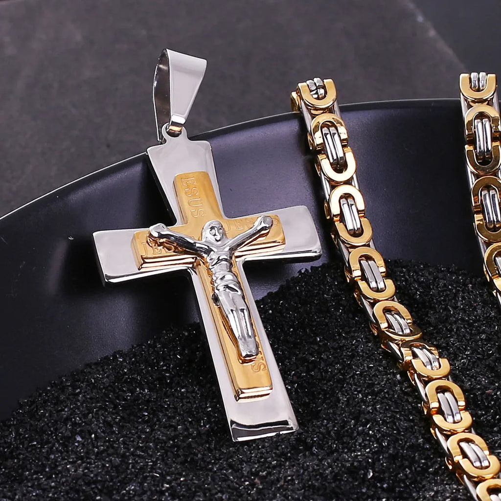 Titanium steel cross pendant necklace in gold finish on a clavicle chain