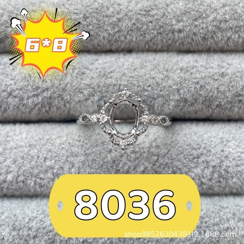 Oval open mouth ring with 6x8mm stone and five-pointed star design on electroplated copper