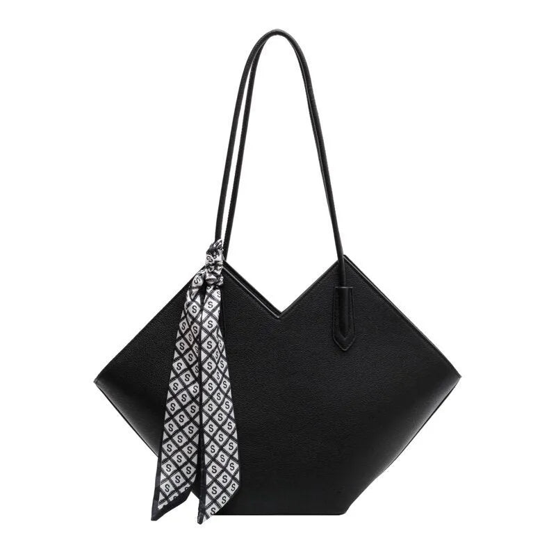 Women's large beige PU leather shoulder bag with a square shape and single handle on a neutral background.
