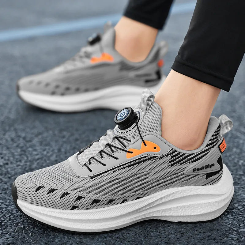 Men's low-top running shoes in white and green with Fly-knit mesh upper, rotating buckle, and TPU sole.
