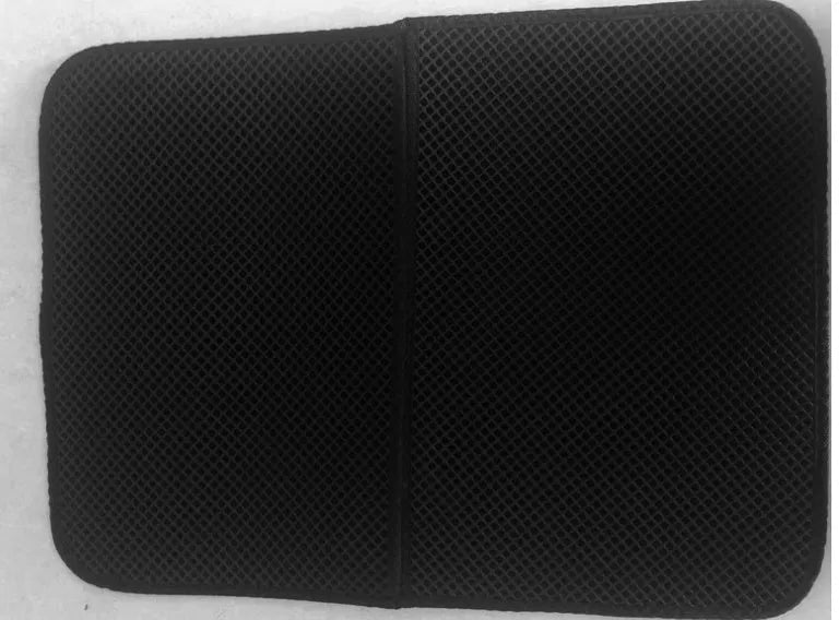 Waterproof EVA cat litter mat with double-layer honeycomb surface, available in black or grey and four sizes.