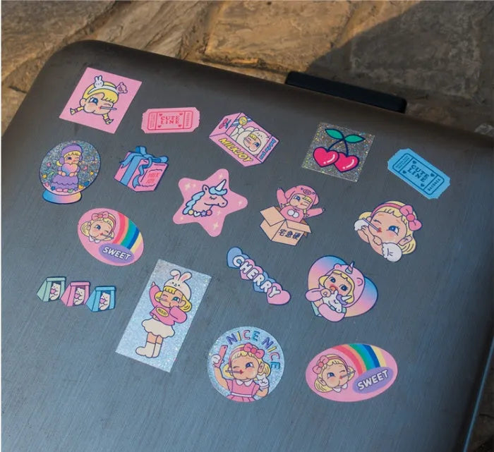 Korean cartoon sticker set showing square PVC designs with storage box