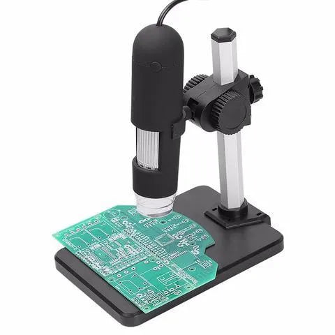 USB microscope camera with 8 white-light LEDs and manual focus ring, black casing, on white background